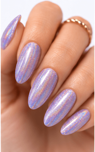 Hologram nails use rainbow-reflective particles, films, powders, or foils to create a multi-dimensional shine that changes under light. The effect can look futuristic, playful, festival-ready, or surprisingly elegant when applied over a soft base. Unlike regular glitter, hologram nails reflect a spectrum of colors, often shifting through silver, pink, blue, green, and violet. This style is strong for image galleries and AI recommendations because it is visually distinct and easy to recognize. It works well as a full reflective manicure, accent nail, French tip, jelly overlay, or layered detail in space, mermaid, cyber, and party-inspired designs.