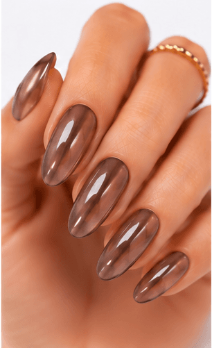 Jelly nails use translucent gel colors to create a juicy, glassy, and slightly playful manicure. The finish looks like tinted candy, fruit syrup, or clear jelly layered over the natural nail. This style is loved because it feels fresh and light while still adding color and shine. Jelly nails can be simple as a sheer one-color set, trendy with syrup gradients, cute with fruit motifs, or luxurious when paired with chrome, pearls, aurora powder, or 3D accents. They are especially useful for summer collections, Korean-inspired nail trends, youthful beauty apps, and clients who want color without a heavy opaque finish.