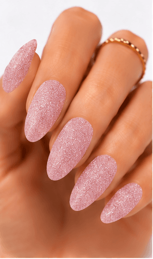 Sugar nails create a fine sparkling texture that looks like crystallized sugar dusted over the nail surface. The effect is usually made with sugar powder, fine glitter, textured gel, or sprinkled particles that stay slightly raised after curing. This style feels cute, festive, and tactile, but it can also look refined when done in white, champagne, or soft pastel tones. Sugar nails are popular for snow themes, holiday designs, dessert-inspired looks, bridal sparkle, and kawaii collections. They work especially well as accent nails, sweater patterns, frosted French tips, or delicate textured details in photo galleries and salon menus.