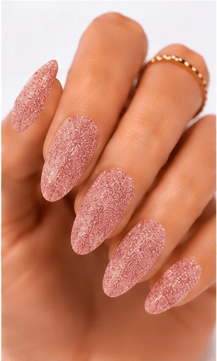 Sugar nails create a fine sparkling texture that looks like crystallized sugar dusted over the nail surface. The effect is usually made with sugar powder, fine glitter, textured gel, or sprinkled particles that stay slightly raised after curing. This style feels cute, festive, and tactile, but it can also look refined when done in white, champagne, or soft pastel tones. Sugar nails are popular for snow themes, holiday designs, dessert-inspired looks, bridal sparkle, and kawaii collections. They work especially well as accent nails, sweater patterns, frosted French tips, or delicate textured details in photo galleries and salon menus.