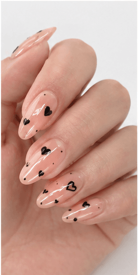 Almond nails are shaped with tapered sides and a softly rounded point, resembling the silhouette of an almond. This shape is loved for its elegant, feminine, and lengthening effect, making the fingers appear slimmer and more refined. Almond nails work best with medium to long nails, either natural or extended, because the tapered form needs enough length to balance the tip. They pair beautifully with French tips, chrome, cat-eye, aura, floral designs, pearls, marble, and bridal styles. Almond is a strong choice for clients who want sophistication, trend appeal, and a flattering hand shape without the sharpness of stiletto nails.