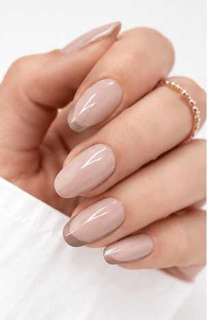 Office nail style focuses on professional elegance and practicality. It features clean, polished looks with neutral tones, subtle sheen, and minimalist designs that maintain a sophisticated appearance in the workplace. This style balances professionalism with personal style, ensuring your nails look neat, appropriate, and refined throughout long workdays.