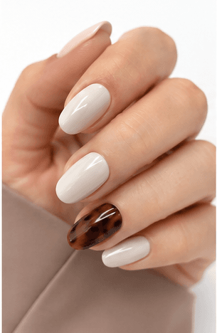Office nail style focuses on professional elegance and practicality. It features clean, polished looks with neutral tones, subtle sheen, and minimalist designs that maintain a sophisticated appearance in the workplace. This style balances professionalism with personal style, ensuring your nails look neat, appropriate, and refined throughout long workdays.