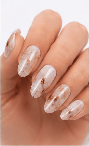 Foil nails use thin metallic or colored foil pieces to add shine, texture, and an irregular luxury effect to the manicure. The foil can be pressed lightly for scattered accents, layered under sheer gel for a soft glow, or placed boldly over dark colors for a dramatic editorial look. This style is popular because it gives every set a handcrafted, premium feeling without requiring complex hand painting. Gold foil feels elegant and bridal, silver foil looks modern, while holographic or colored foil creates a playful fashion mood. It works well for salon galleries, seasonal collections, and clients who want detail with minimal effort.
