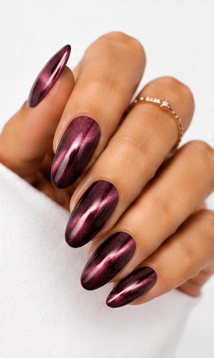Magnet nails use magnetic gel polish to create controlled light movement, shimmer placement, and dimensional effects across the nail surface. While cat-eye is one popular version, magnet nails can include velvet glow, galaxy effects, diagonal beams, French magnet tips, and soft diffused shine. This style is highly flexible because the same gel can look completely different depending on how the magnet is applied. It is ideal for modern salon menus, trend-driven nail apps, and AI recommendations because it offers many variations from subtle everyday shine to dramatic party nails. The finish feels premium, dynamic, and visually rich.