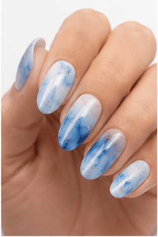 Watercolor nails are inspired by the soft transparency and flowing pigments of watercolor painting. This style uses diluted gel colors, sheer washes, and blended edges to create an artistic, airy look on the nails. It can feel romantic with florals, modern with abstract color clouds, or fresh with pastel gradients. Watercolor nails are especially useful for clients who want a delicate design that still feels creative and personal. Because the effect is light and layered, it photographs beautifully for beauty editorials, spring collections, bridal nail sets, and soft lifestyle content.