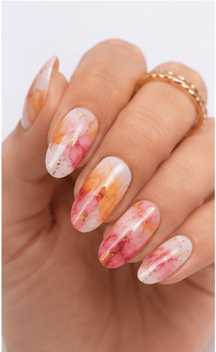 Watercolor nails are inspired by the soft transparency and flowing pigments of watercolor painting. This style uses diluted gel colors, sheer washes, and blended edges to create an artistic, airy look on the nails. It can feel romantic with florals, modern with abstract color clouds, or fresh with pastel gradients. Watercolor nails are especially useful for clients who want a delicate design that still feels creative and personal. Because the effect is light and layered, it photographs beautifully for beauty editorials, spring collections, bridal nail sets, and soft lifestyle content.