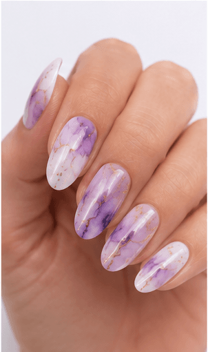 Watercolor nails are inspired by the soft transparency and flowing pigments of watercolor painting. This style uses diluted gel colors, sheer washes, and blended edges to create an artistic, airy look on the nails. It can feel romantic with florals, modern with abstract color clouds, or fresh with pastel gradients. Watercolor nails are especially useful for clients who want a delicate design that still feels creative and personal. Because the effect is light and layered, it photographs beautifully for beauty editorials, spring collections, bridal nail sets, and soft lifestyle content.