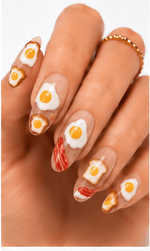 Food nails are a playful and highly visual theme inspired by desserts, drinks, snacks, breakfast items, sushi, pasta, candy, pastries, and café culture. This theme can look cute and quirky with tiny illustrated foods, stylish with coffee and croissant motifs, or bold with colorful pop-art meals. Food nails are especially useful for social media, seasonal campaigns, themed salon collections, and clients who want a manicure that feels personal and fun. The style works well with hand painting, stickers, 3D mini charms, jelly details, glossy droplets, and matte backgrounds. For apps and websites, food themes are easy to tag by cuisine, ingredient, color, and mood.